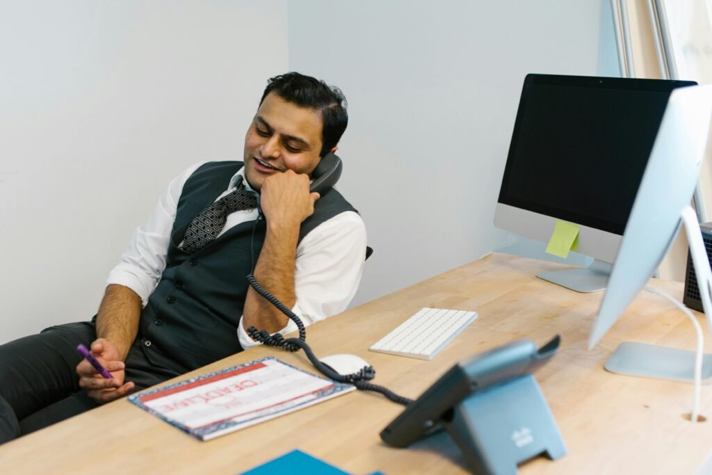 Man Talking on the Telephone