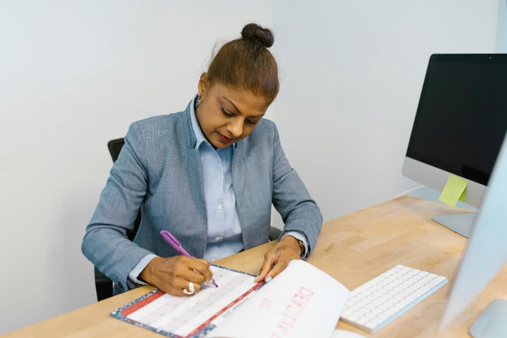 Woman Marking Her Calendar