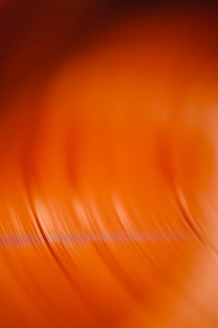 Spinning Orange Vinyl Record